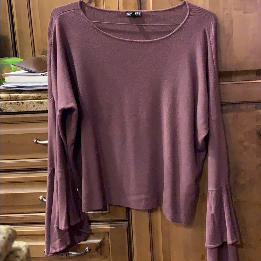 A super cute long sleeved top with bell sleeves